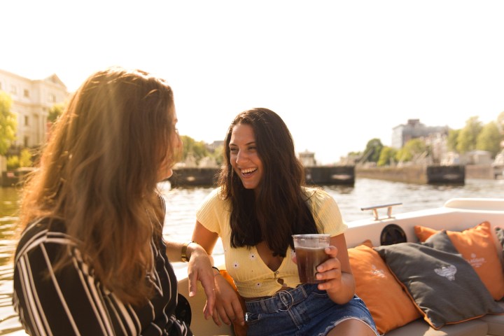 a woman sitting on a table