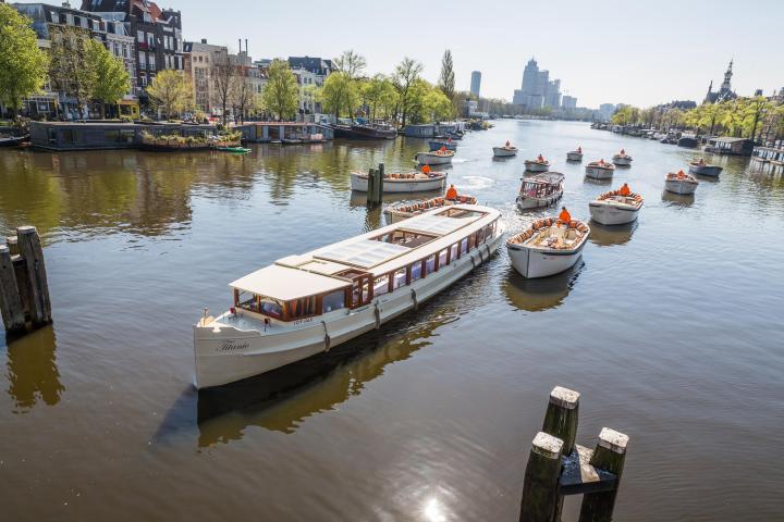 a boat is docked next to a body of water